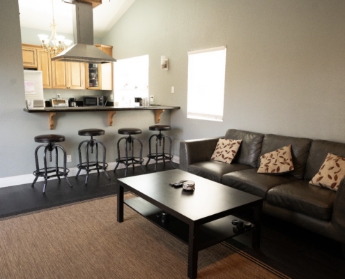 Spacious and welcoming common area designed to encourage connection, relaxation, and community.